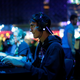 An attendee plays the video game World of Warcraft at the BlizzCon, Friday, Nov. 6, 2015, in Anaheim, California.